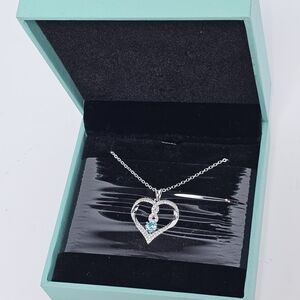Elegant Silver‎ Heart Necklace with Blue Accents